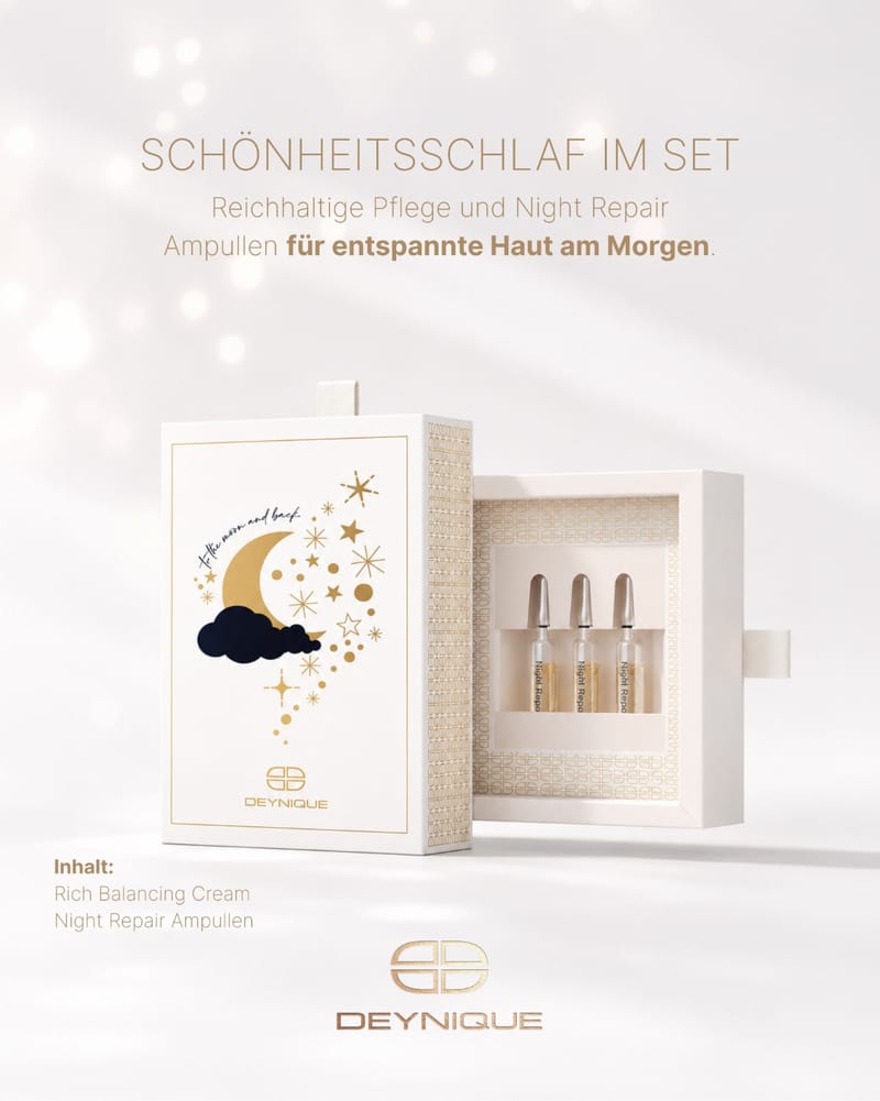 DEYNIQUE Geschenkset Die Ruhe selbst: Geschenkbox mit Mond und Sternen, daneben geöffnet mit drei Night Repair Ampullen. Bildtext: Schönheitsschlaf im Set. Reichhaltige Pflege und Night Repair Ampullen für entspannte Haut am Morgen. Inhalt: Rich Balancing Cream, Night Repair Ampullen.