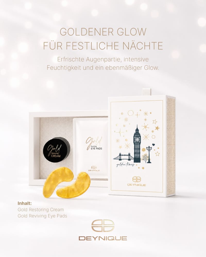 DEYNIQUE Geschenkset Golden Times: Geschenkbox mit Big Ben, davor Gold Restoring Cream und goldene Augenpads. Bildtext: Goldener Glow für festliche Nächte. Erfrischte Augenpartie, intensive Feuchtigkeit und ein ebenmäßiger Glow. Inhalt: Gold Restoring Cream, Gold Reviving Eye Pads.